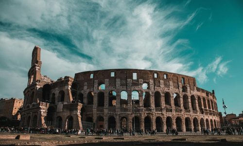Stunning view of the Colosseum in Rome showcasing its ancient architecture and historic grandeur.